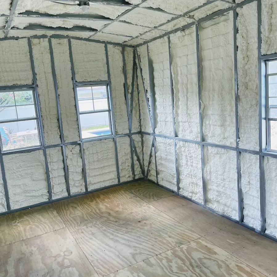 Closed-cell spray foam insulation applied to wall cavities in a residential project in Suffolk